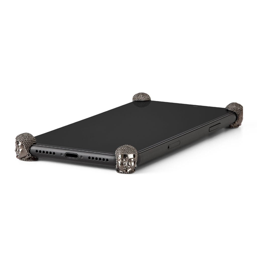 Carbon Buddha ICONS installed on all four corners of a bare iPhone 11 Pro / Pro Max