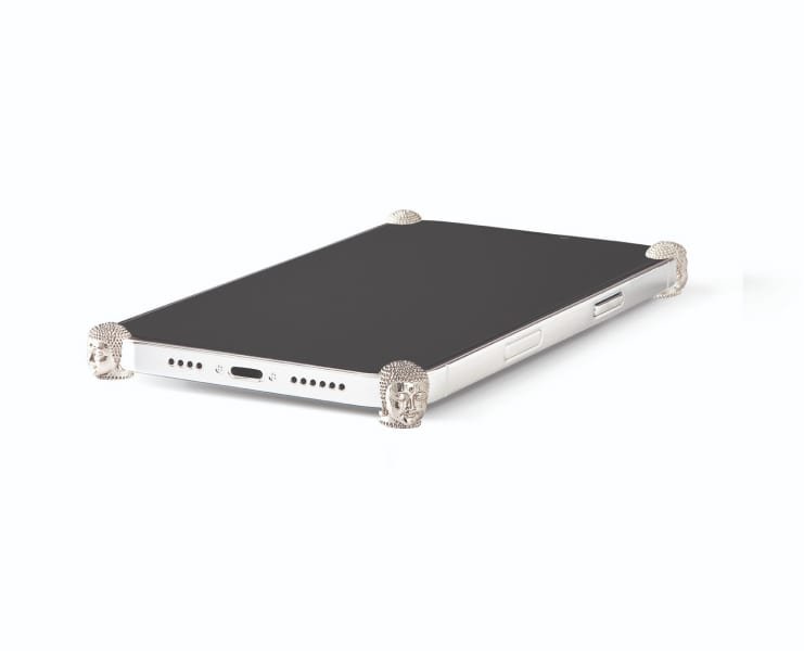 Silver Buddha ICONS installed on all four corners of a bare iPhone 12 / 12 Pro / Max / mini