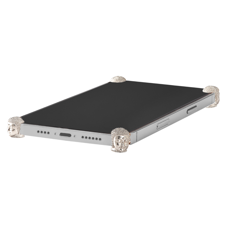 Silver Buddha ICONS installed on all four corners of a bare iPhone 15 Pro / Pro Max