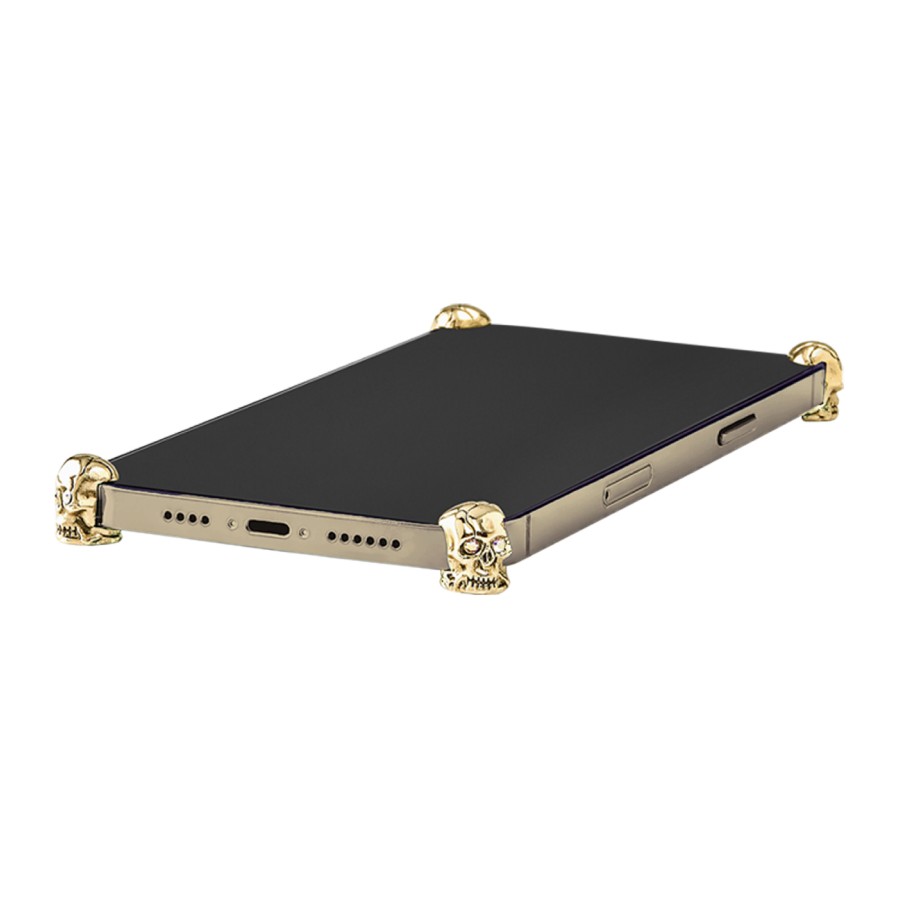 Gold Skull ICONS installed on all four corners of a bare iPhone 16 Pro / Pro Max