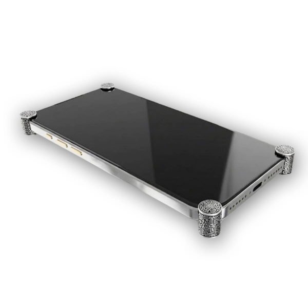 Silver Matrix ICONS installed on all four corners of a bare iPhone 17 Pro / Max