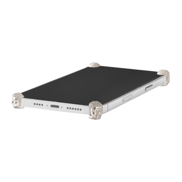 Silver Buddha ICONS installed on all four corners of a bare iPhone 17