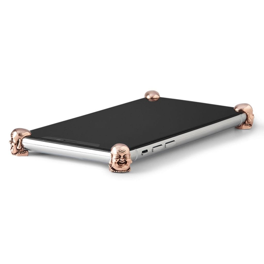 Rose Gold Buddha ICONS installed on all four corners of a bare iPhone X / XS / XS Max