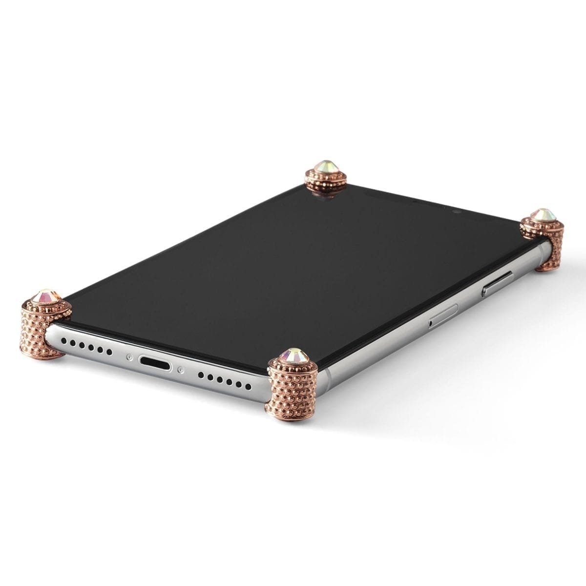Rose Gold Studs & Stones ICONS installed on all four corners of a bare iPhone X / XS / XS Max