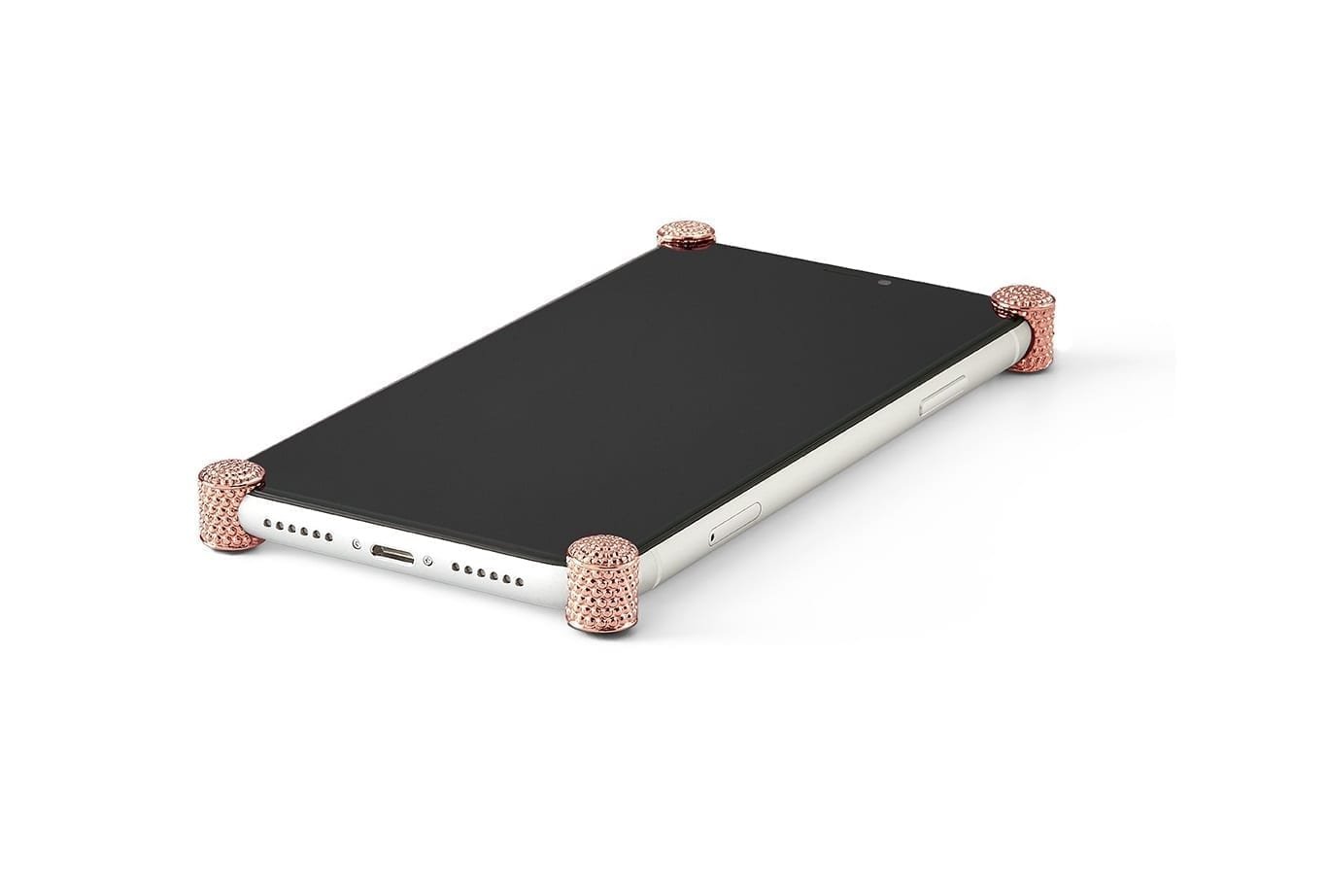 Rose Gold Dragon ICONS installed on all four corners of a bare iPhone XR